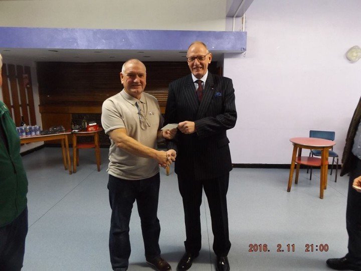 Russell Morgan Spokes Person presenting cheques to Lt Colonel Mcpherson MBE from MCVC military community ventres centre rotherham