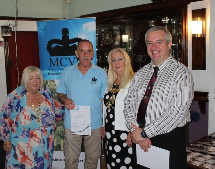 Bill Carroll receiving his certificate from The Mayor 